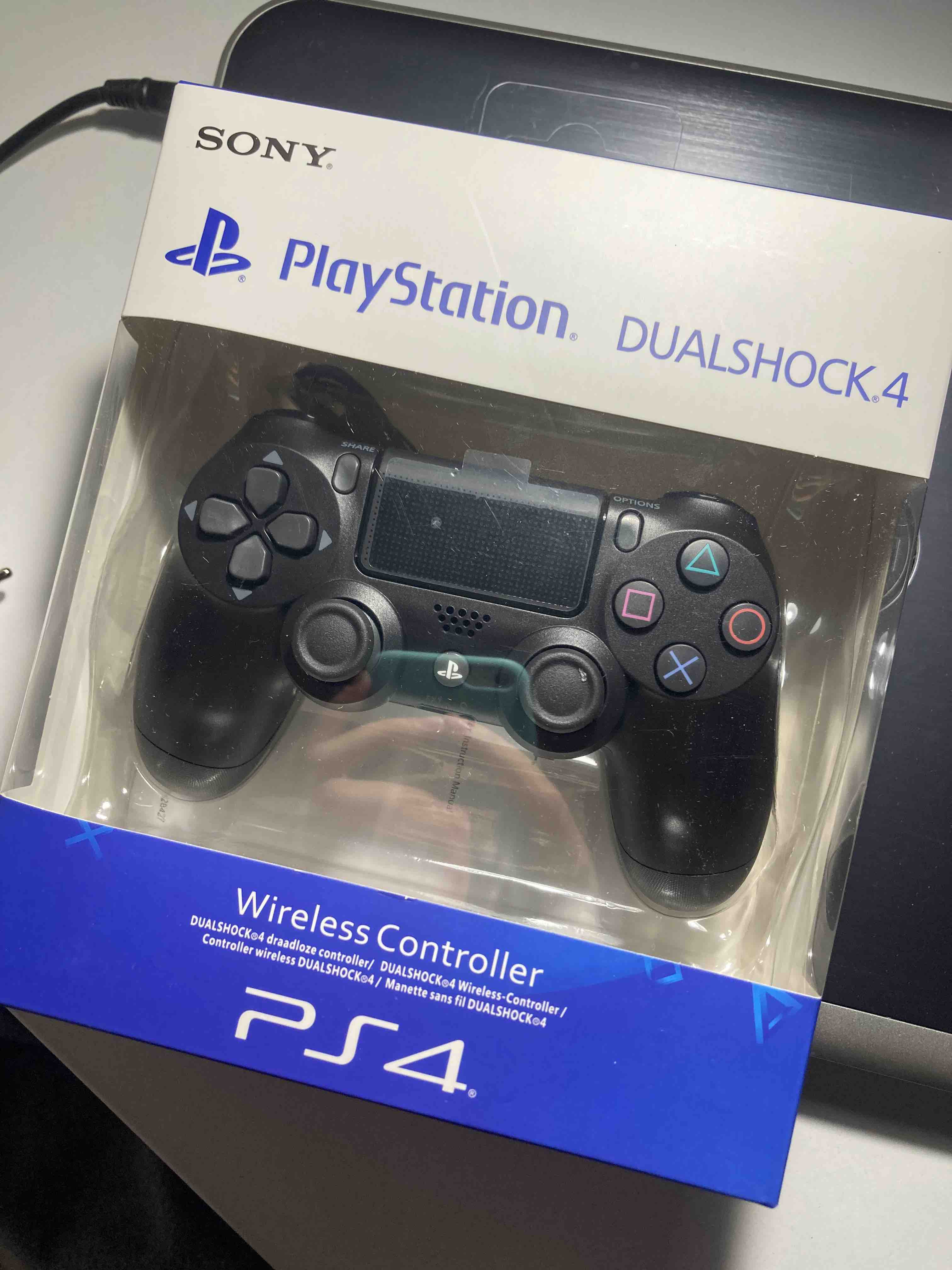 Геймпад Sony DualShock 4 v2 для Playstation 4 Black (CUH-ZCT2E) - отзывы  покупателей на маркетплейсе Мегамаркет | Артикул: 100000067497