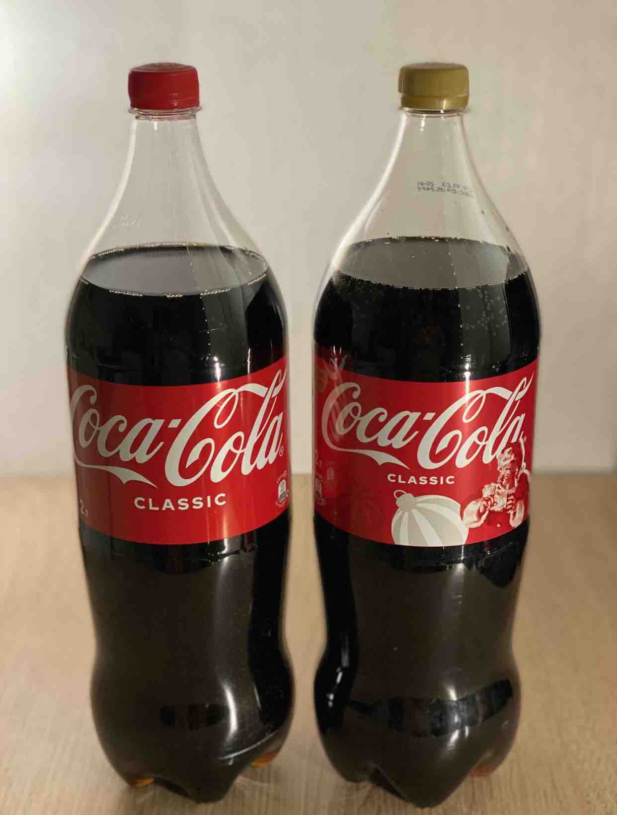 Газированный напиток Coca-Cola 2 л - отзывы покупателей на маркетплейсе  Мегамаркет | Артикул: 100040265057