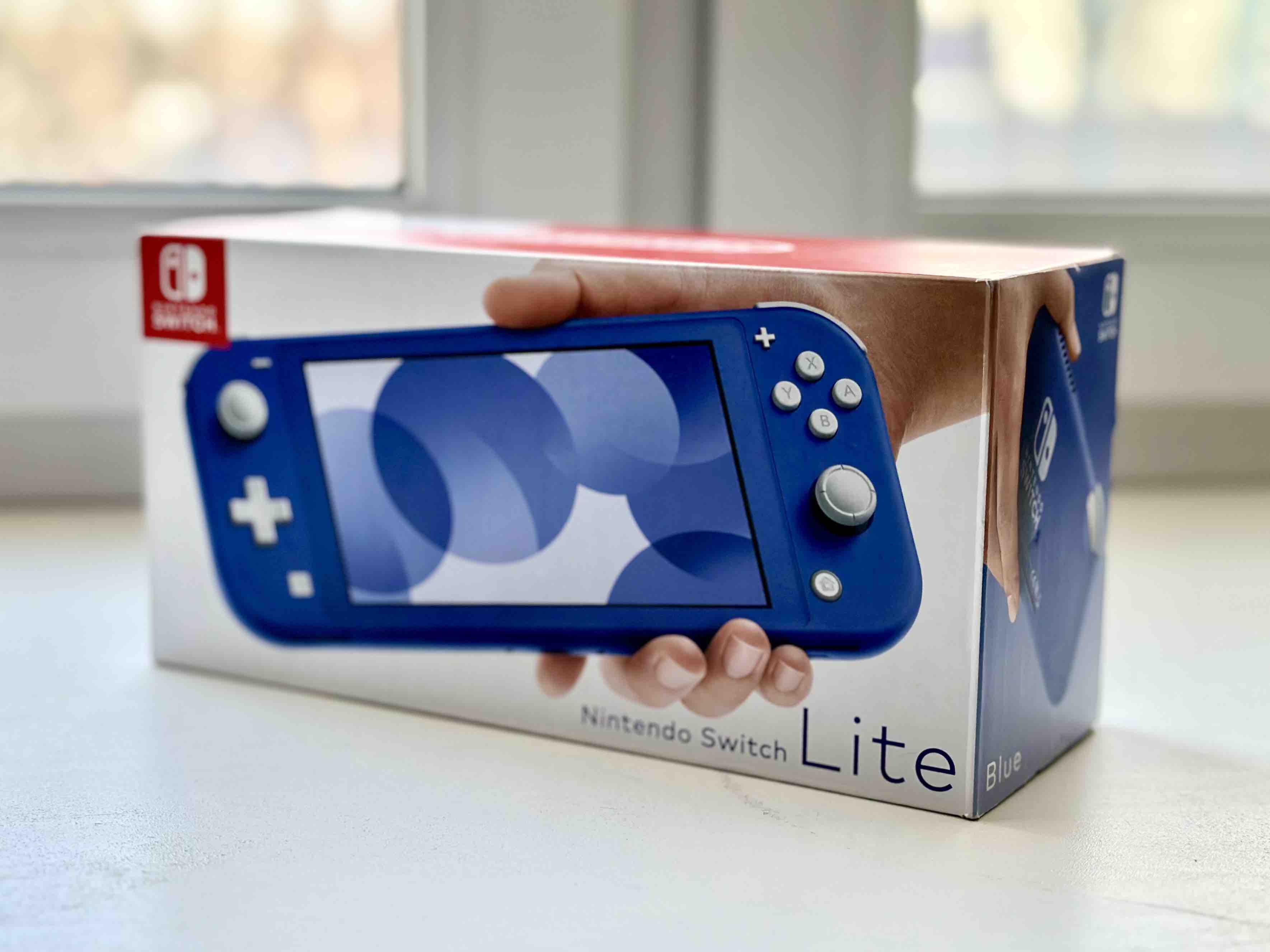 Игровая приставка Nintendo Switch Lite Blue, 32 ГБ, купить в Москве, цены в  интернет-магазинах на Мегамаркет