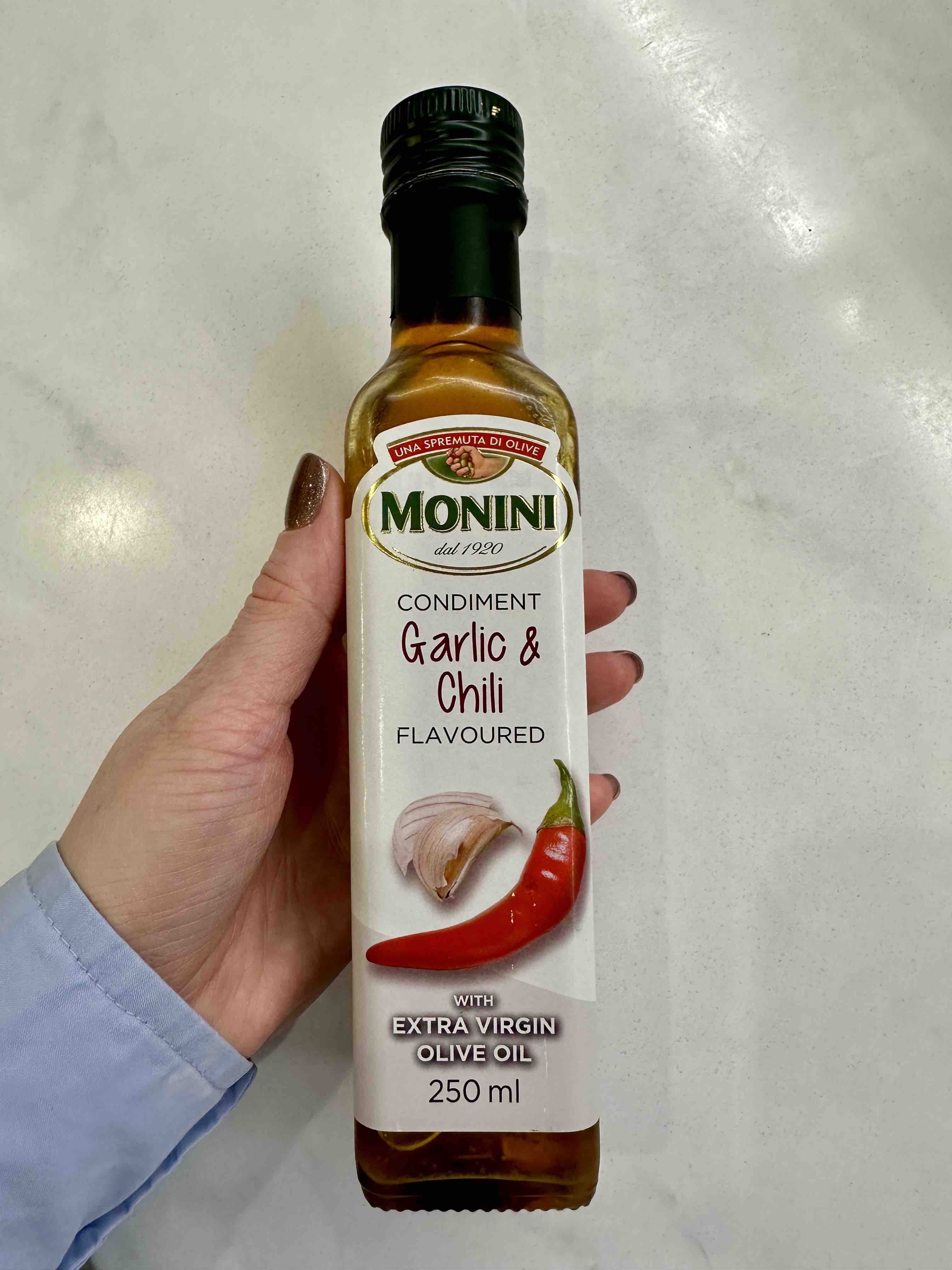 Масло Monini garlic&chili чеснок и перец чили оливковое 250 мл - отзывы  покупателей на маркетплейсе Мегамаркет | Артикул: 100023890221