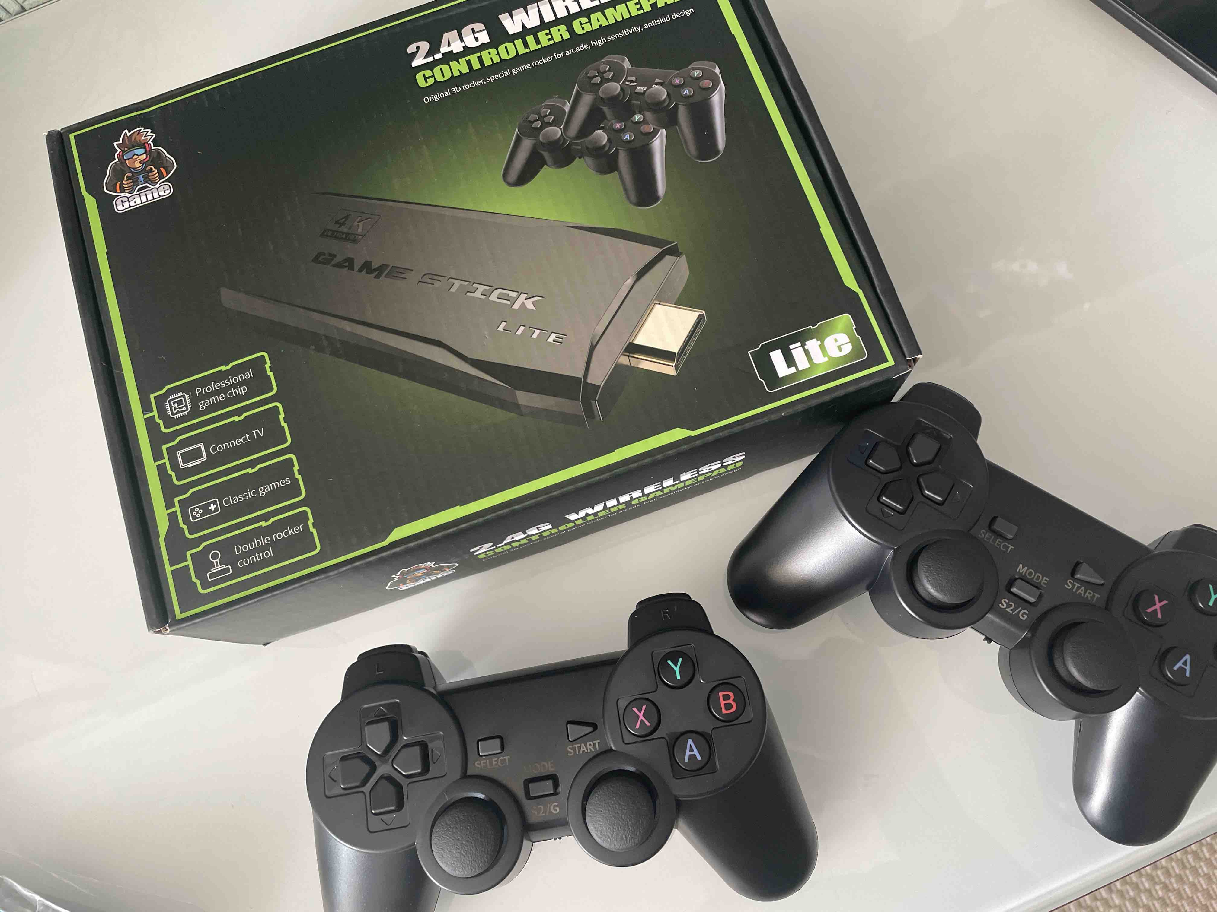 Игровая приставка NoBrand Game Stick Lite 64GB + 10000 ретро игр + джойстик  2 шт. - купить в Wide_Store, цена на Мегамаркет